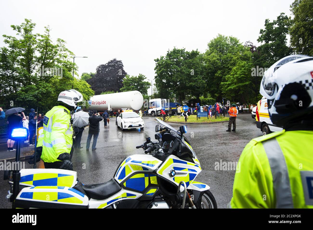 An empty colossal-sized ‘Air Liquide’ medical grade oxygen tank being transported on a 164ft (50m) lorry across Four Oaks, Sutton Coldfield. Stock Photo