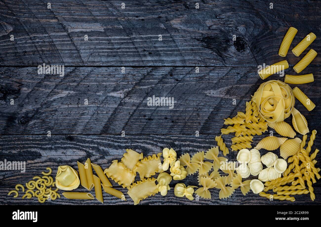 Noodle Making Rustic Noodle concept template on dark rustic wood Stock Photo - Alamy