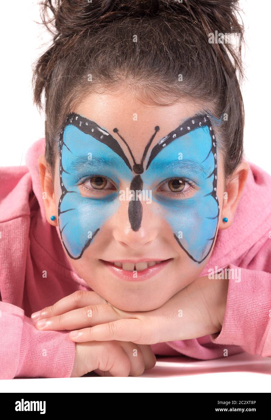 Girl with animal face-paint isolated in white Stock Photo - Alamy