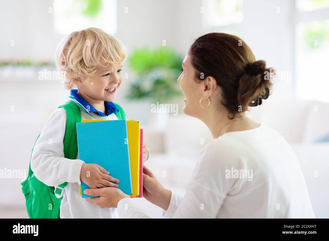 Child going back to school. Mother and kid getting ready for first school day after vacation. Little boy and mom going to kindergarten or preschool. S Stock Photo - Alamy