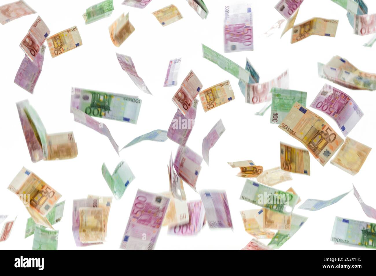 Money rain of Euro banknotes isolated on white background. Stock Photo