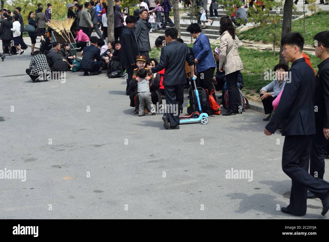 Pyongyang, North Korea - May 1, 2019: People gather to celebrate May 1st Labor Day on the Pyongyang street Stock Photo