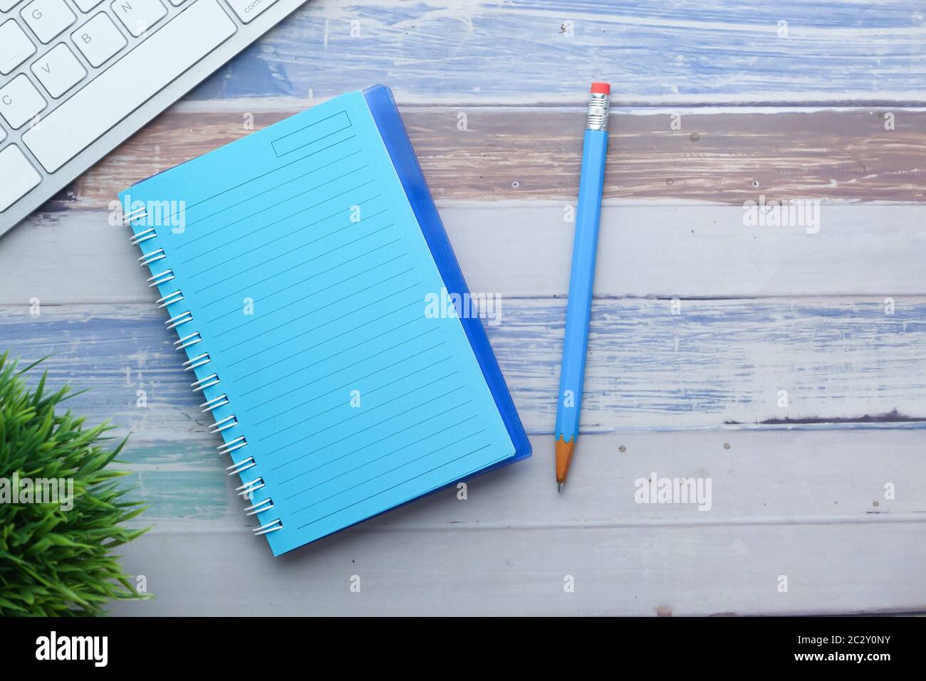 high angle view of notepad with pencil on table  Stock Photo