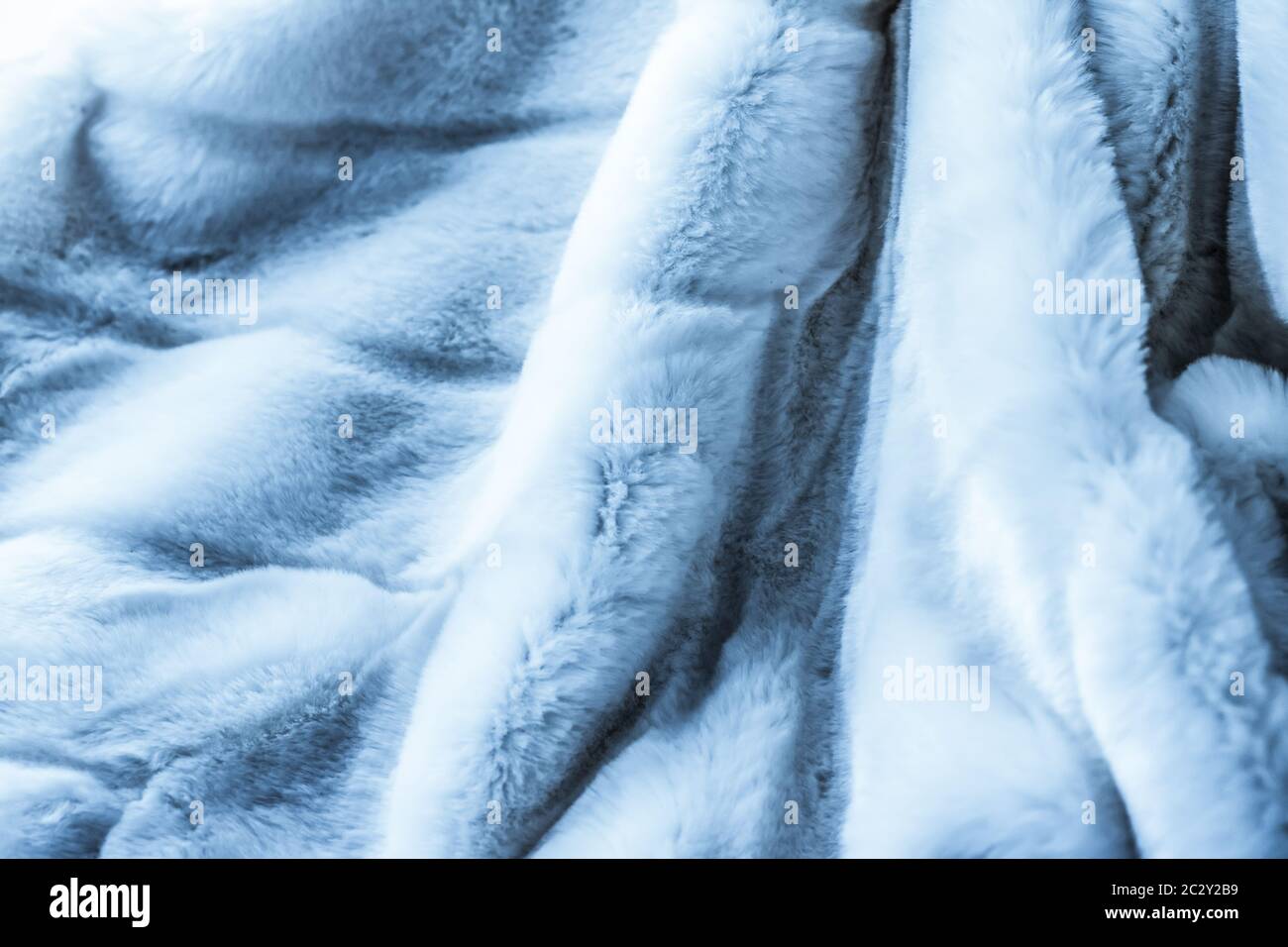 Luxury blue fur coat texture background, artificial fabric detail Stock Photo