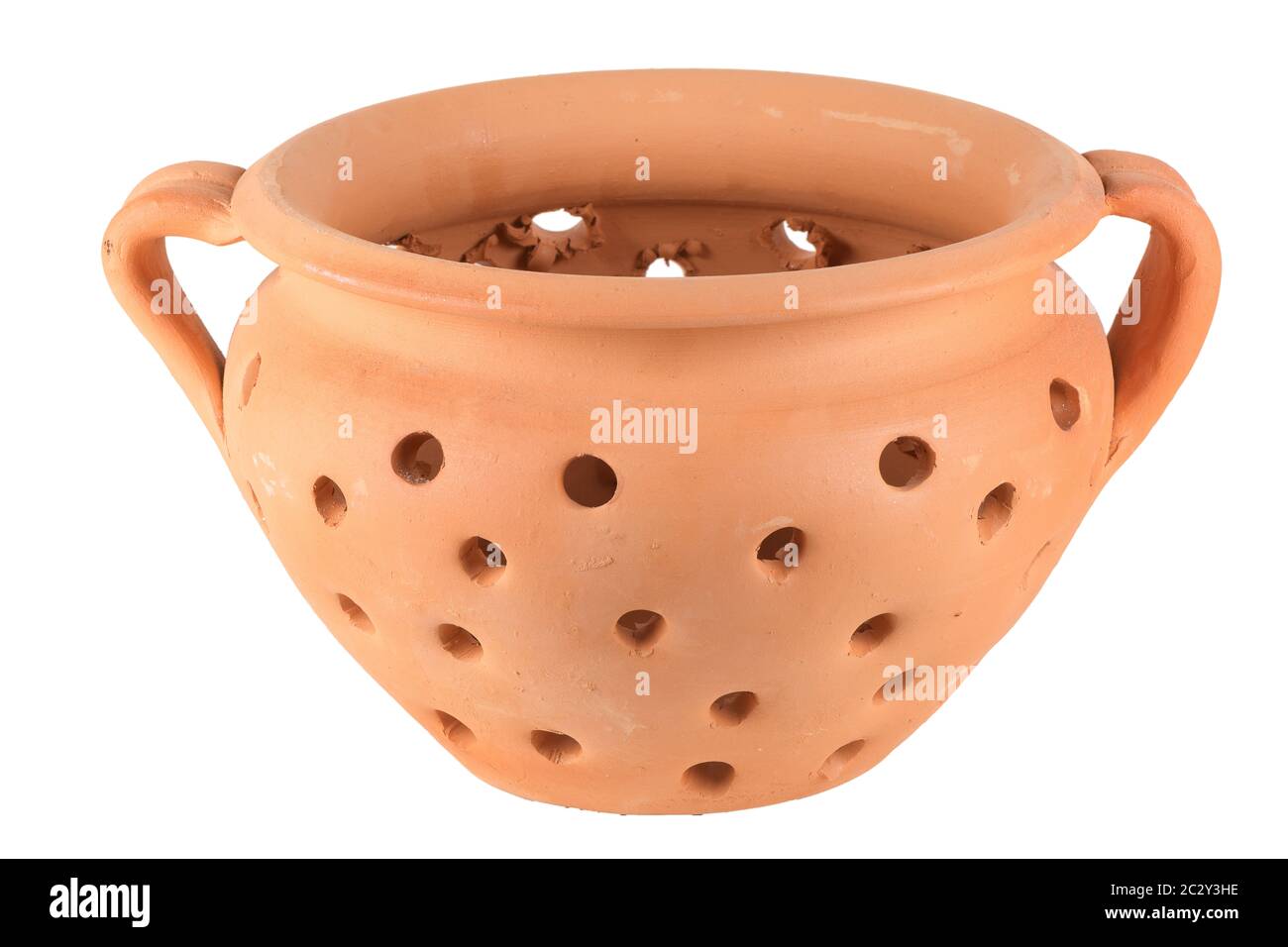 Traditional portuguese ceramic pot with holes for baking chestnuts isolated  on white background Stock Photo - Alamy