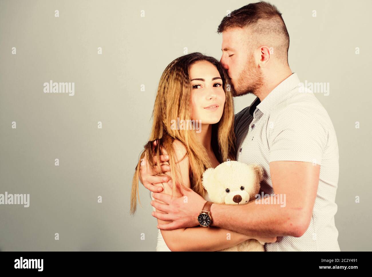 Enjoying each other. Happy family. Valentines day holiday. Soft toy teddy bear gift. Man and woman couple in love. Family love. Romantic surprise picture picture