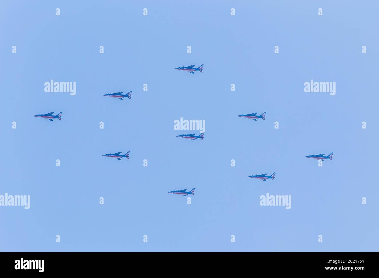 Fixed Formation of the 9 Aircraft comprising French Air Force Display Team- Patrouille Acrobatique de France Stock Photo