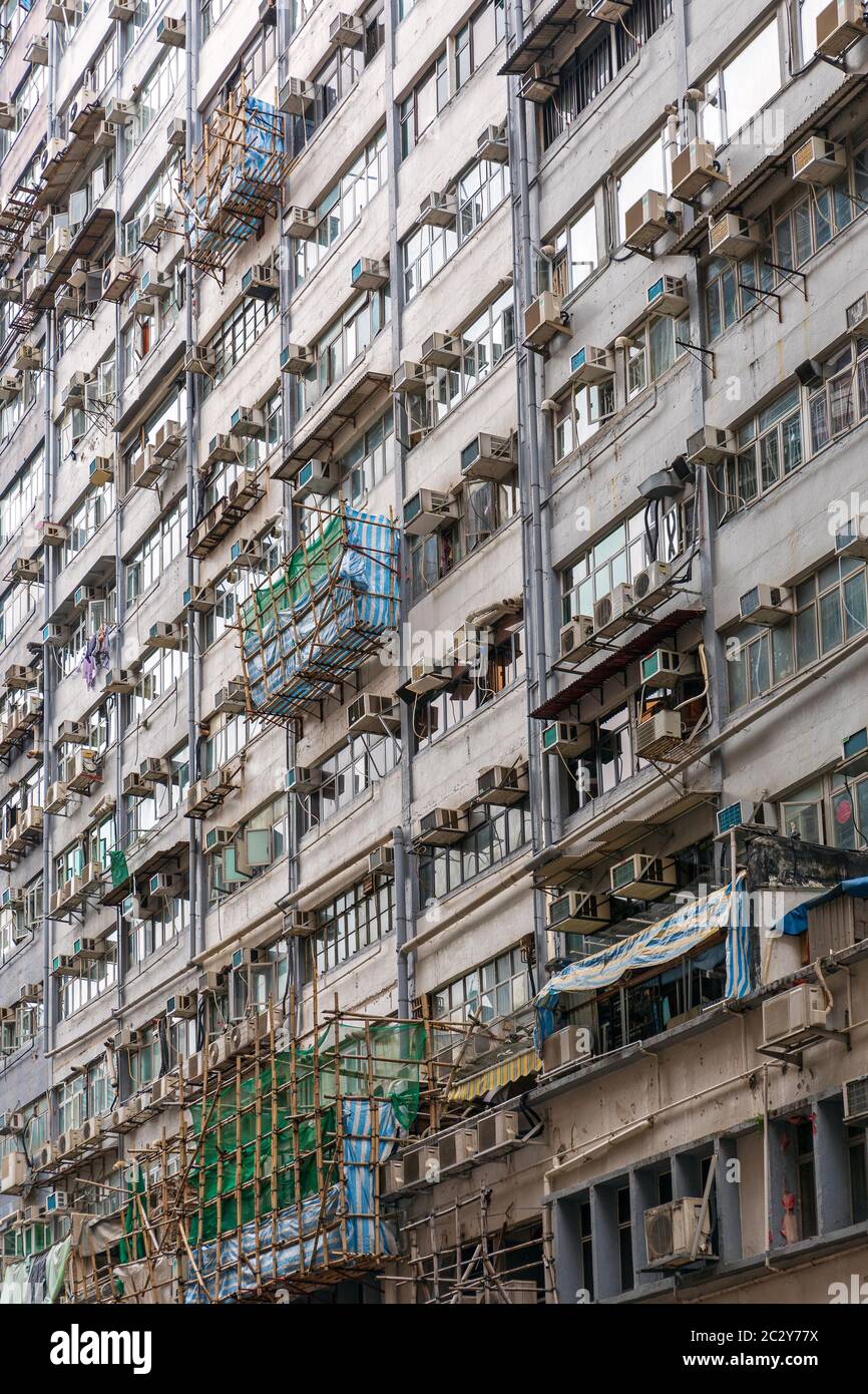Residential Building Facade With Air Conditioners in Hong Kong Stock