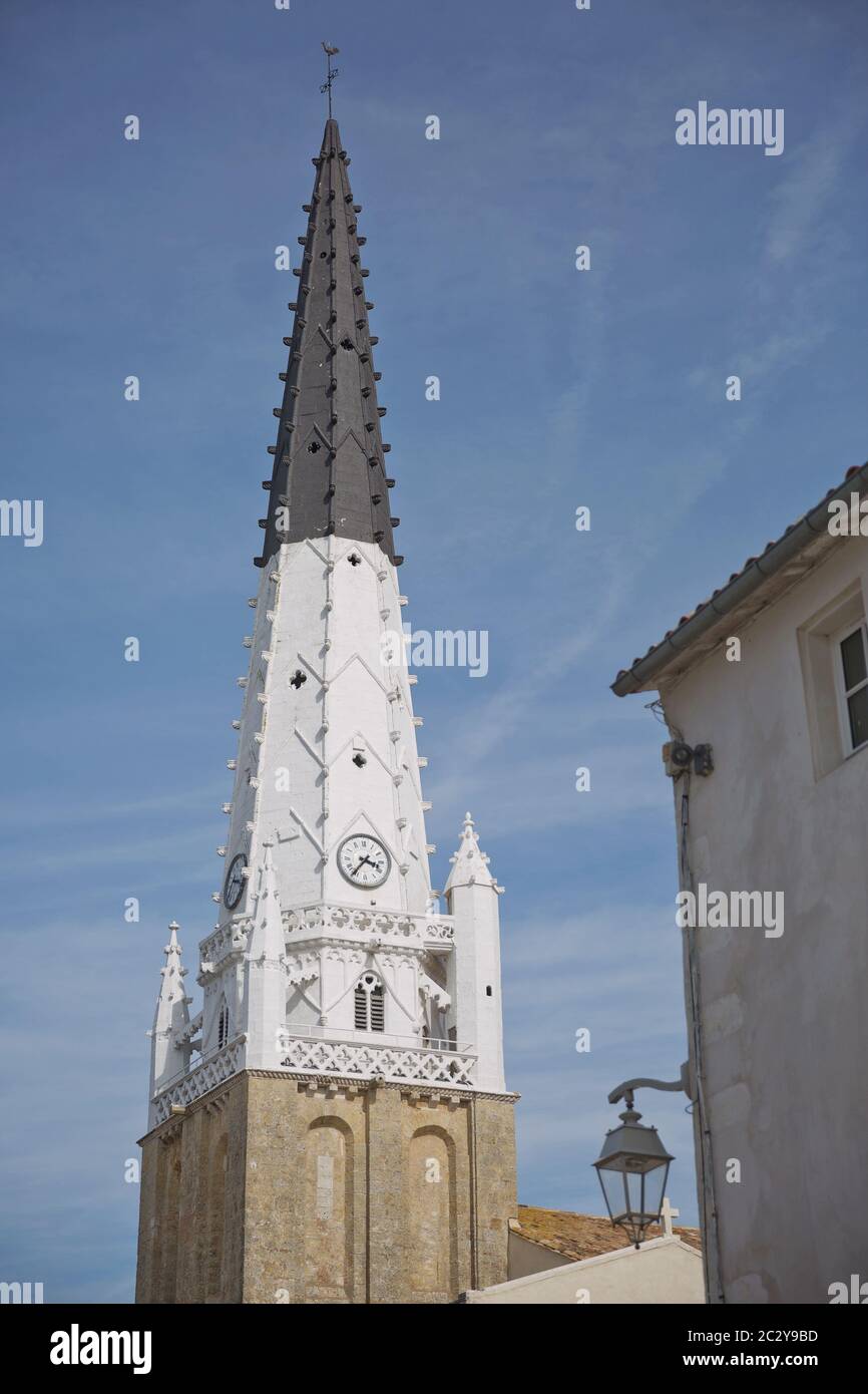 Church of Ars with black and white bell tower in the Ile de Re in Charente France Stock Photo