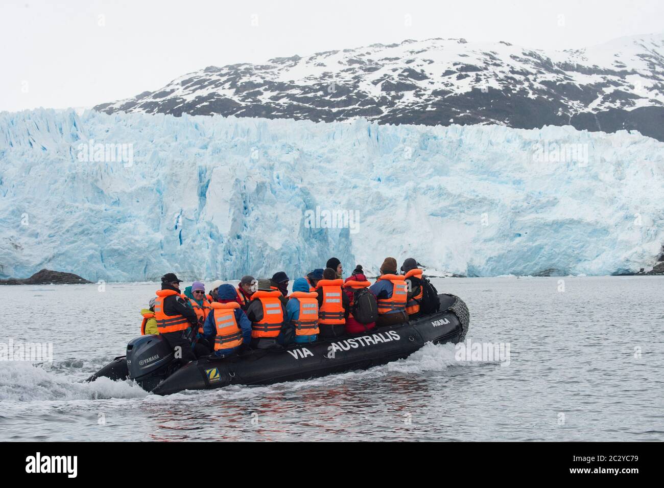 Winter motorboat trip in Cordillera Darwin, Patagonia, Chile, South America Stock Photo