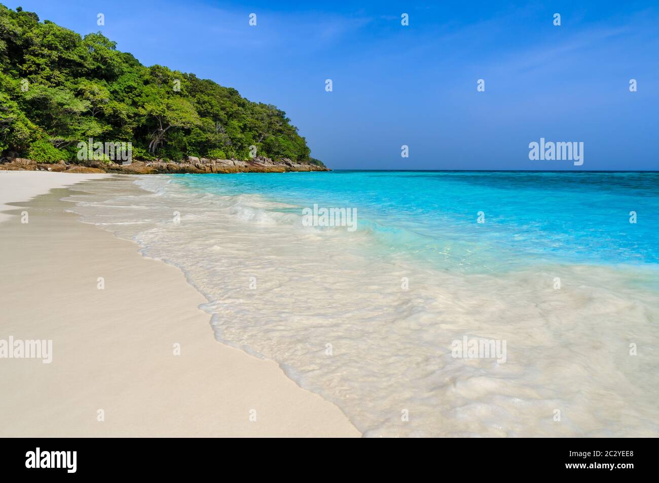Summer view of tropical white sand beach and turquoise clear Andaman sea in Phang Nga Province, Thailand Stock Photo