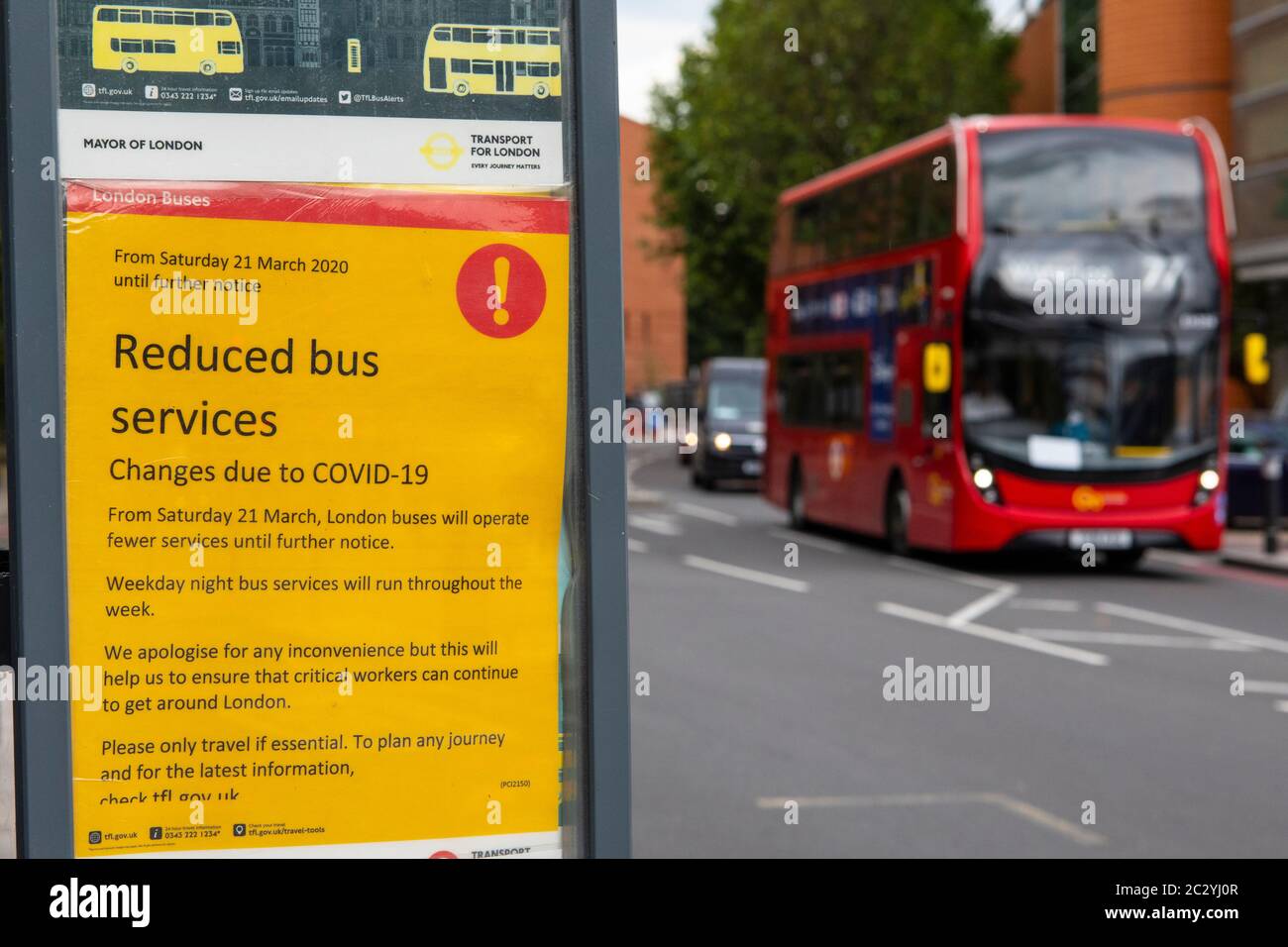 London, UK - June 17th 2020: A sign at a bus stop in South London, UK, detailing the reduced bus services in London during the Coronavirus pandemic. Stock Photo