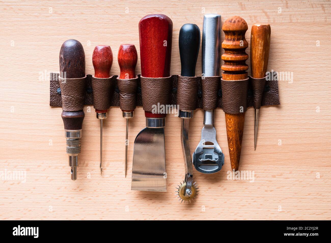 Leather Craft Tools On Wall In Tailoring Workshop Stock Photo
