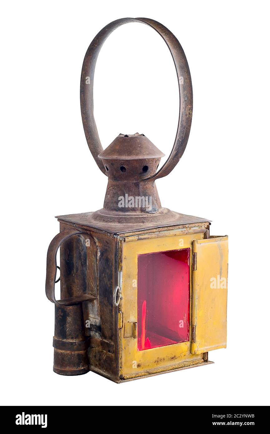 Old rusty railroad lantern. Isolated on white Stock Photo