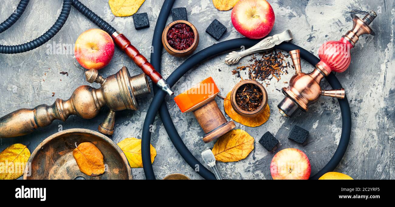 Preparation of a smoking hookah.Oriental hookah with a fruit aroma