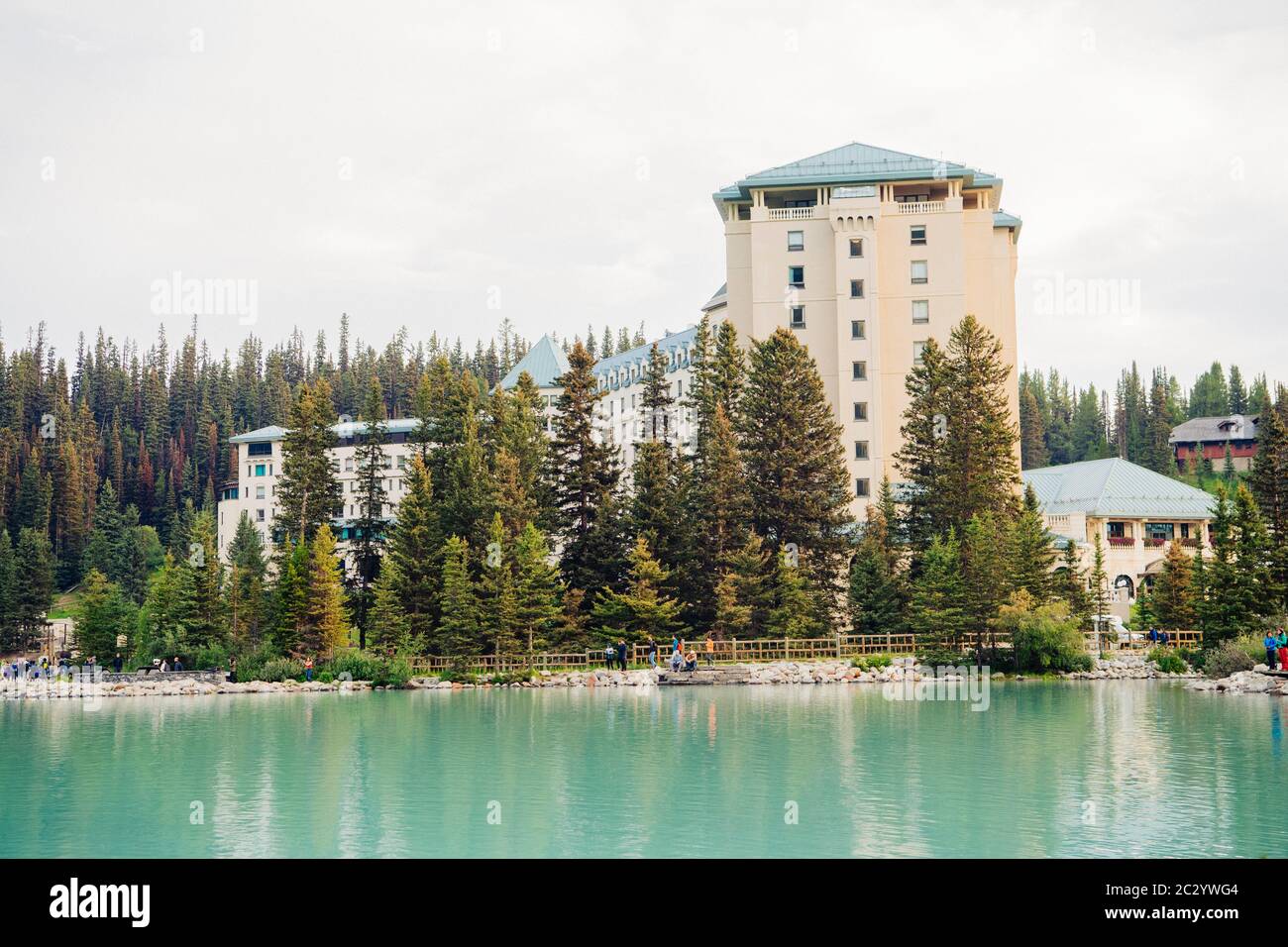 Isolated tourist resort next to calm lake, Banff, Alberta, Canada Stock Photo