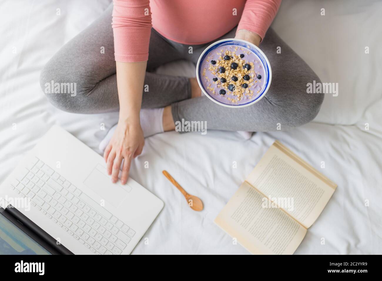 Pregnant woman lay on bed hires stock photography and images Alamy