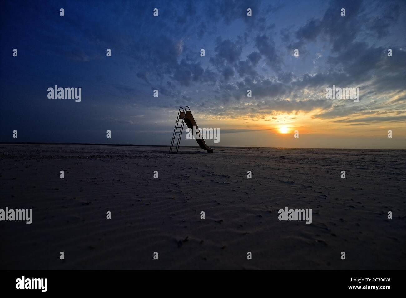 Dramatic sunset on the beach, Langeoog, East Frisian Islands, Germany Stock Photo