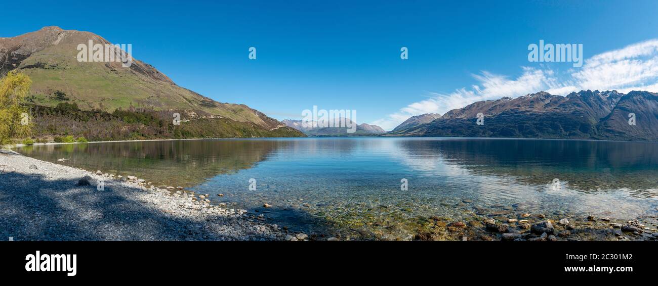Mountains reflected in the lake, Lake Wakatipu, Otago, South Island, New Zealand Stock Photo