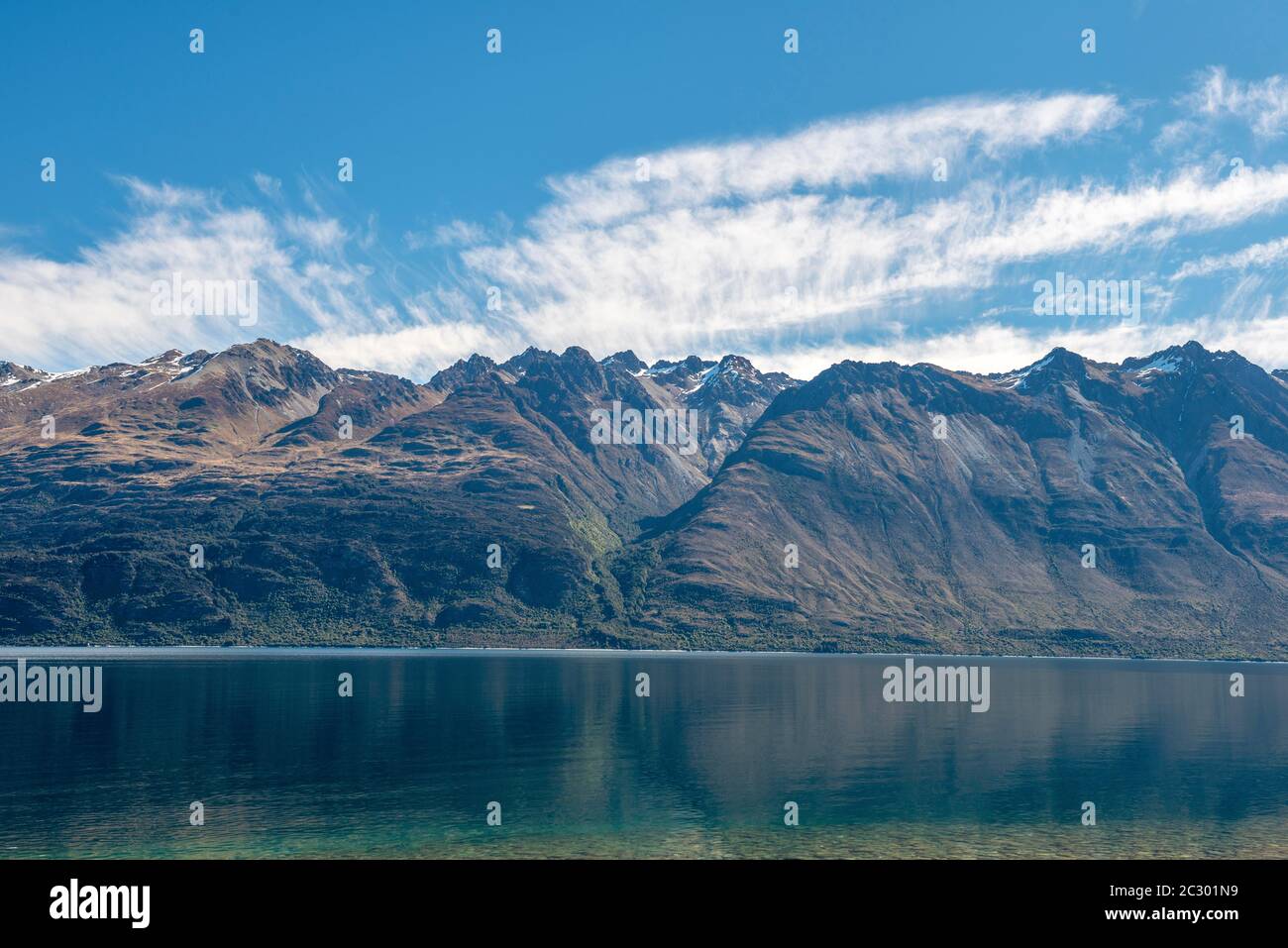 Mountains mirror the lake, Lake Wakatipu, Otago, South Island, New Zealand Stock Photo