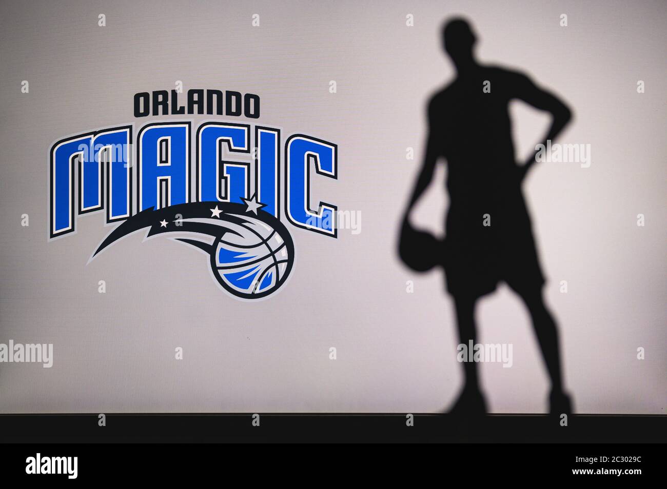 NEW YORK, USA, JUN 18, 2020: Orlando Magic logo of professional basketball  club in american league. Silhouette of basket player in foreground. Sport c  Stock Photo - Alamy