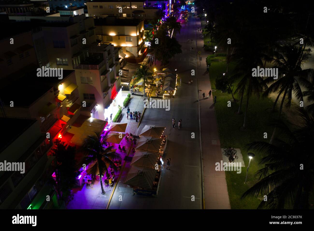 Aerial night photo tourists returning to Miami Beach during phase 1 reopening Coronavirus Covid 19 pandemic 2020 Stock Photo