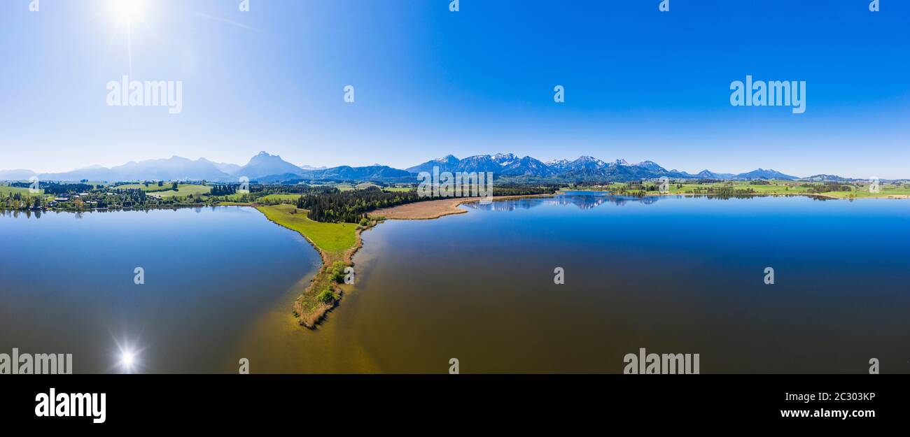 Panorama, southern shore of Hopfensee, Ammergau Alps and Tannheim mountains, hops at the lake, near Fuessen, drone picture, East Allgaeu, Allgaeu Stock Photo