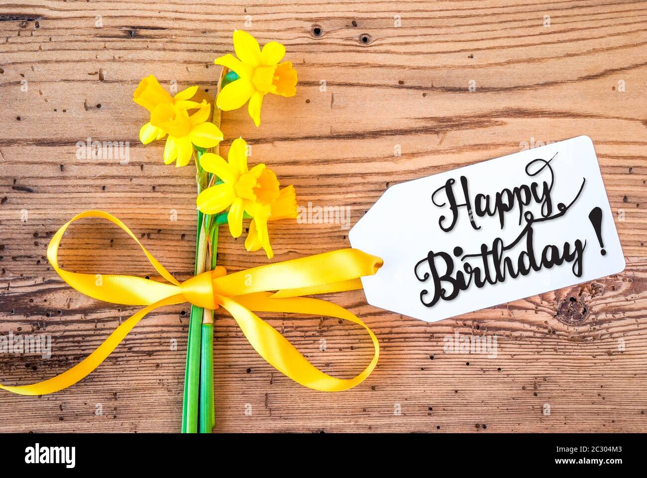 Label With English Calligraphy Happy Birthday Yellow Spring Narcissus Flower On Rustic Wooden Background Stock Photo Alamy