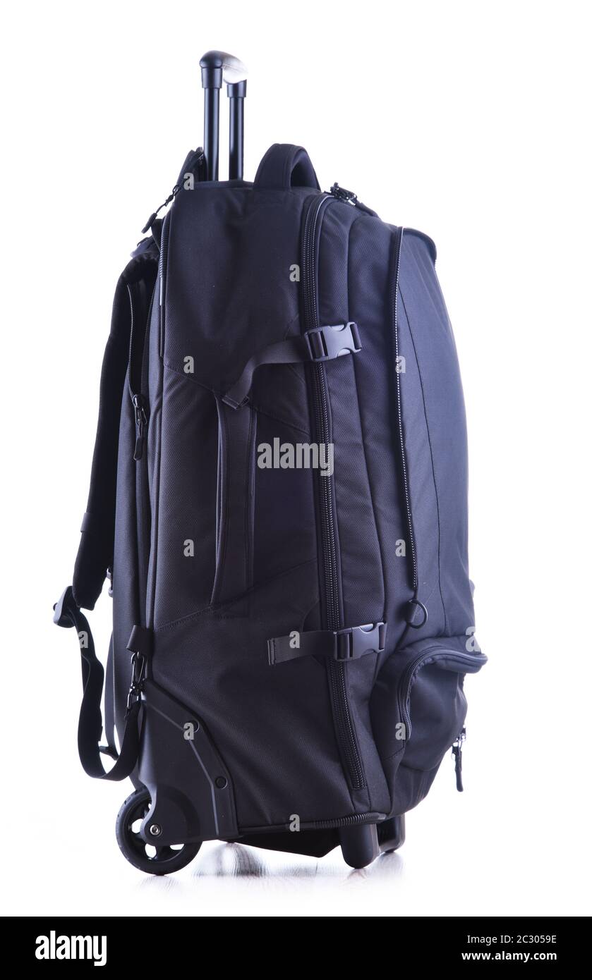 Large black tourist backpack with wheels isolated on white background Stock Photo