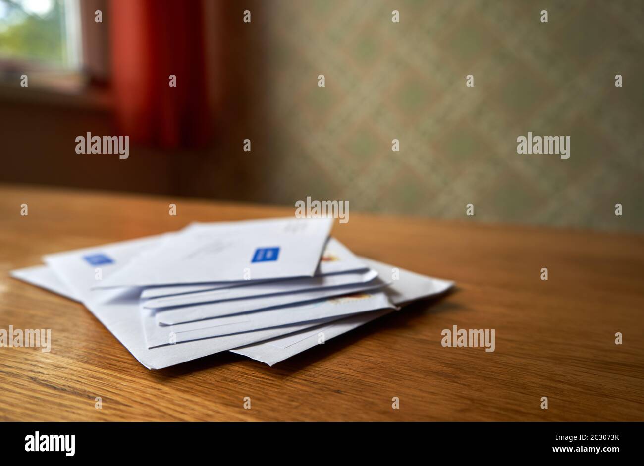 Stack of envelopes on the wooden table Stock Photo