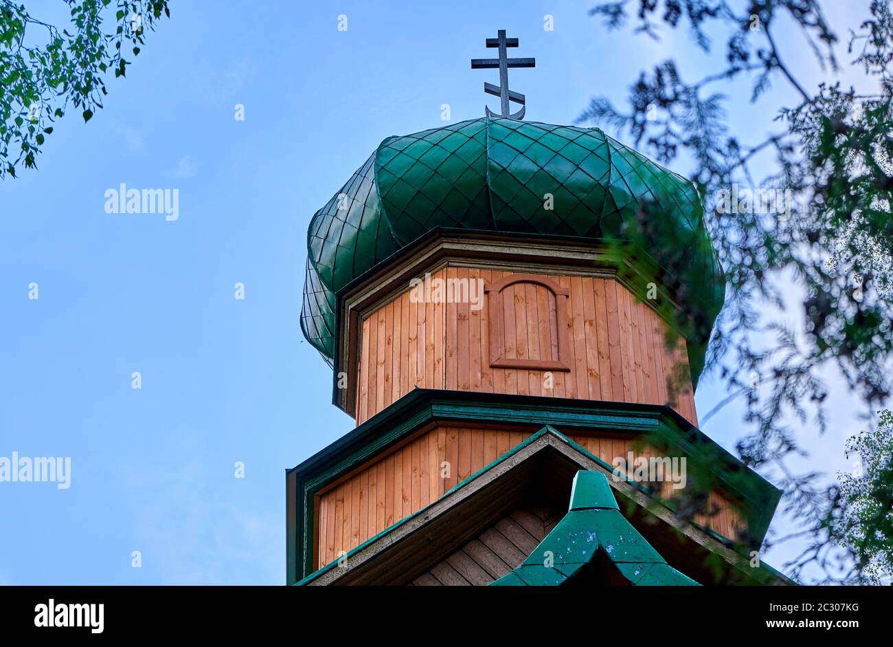 Wooden orthodox church steeple with cross Stock Photo