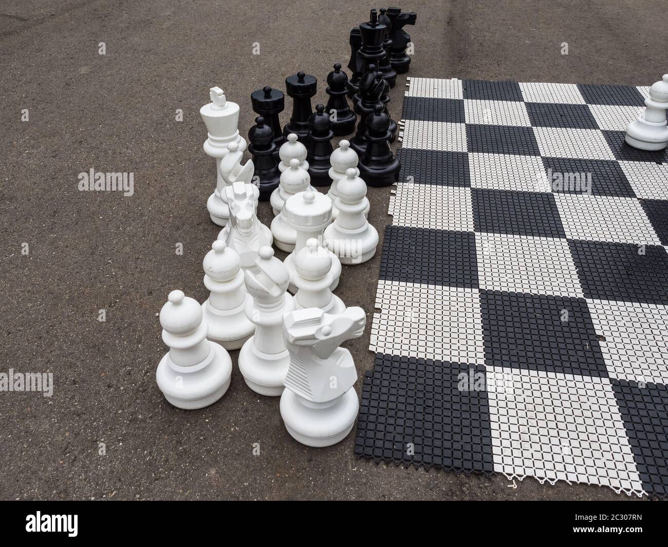 Large chess pieces for playing on the street. Rosa Khutor Stock Photo