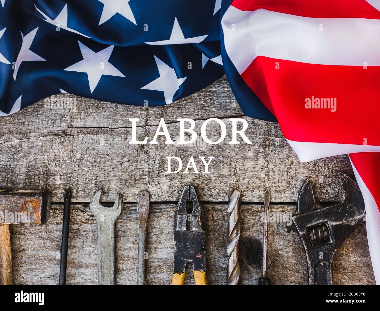 LABOR DAY. Hand tools lying on the table Stock Photo