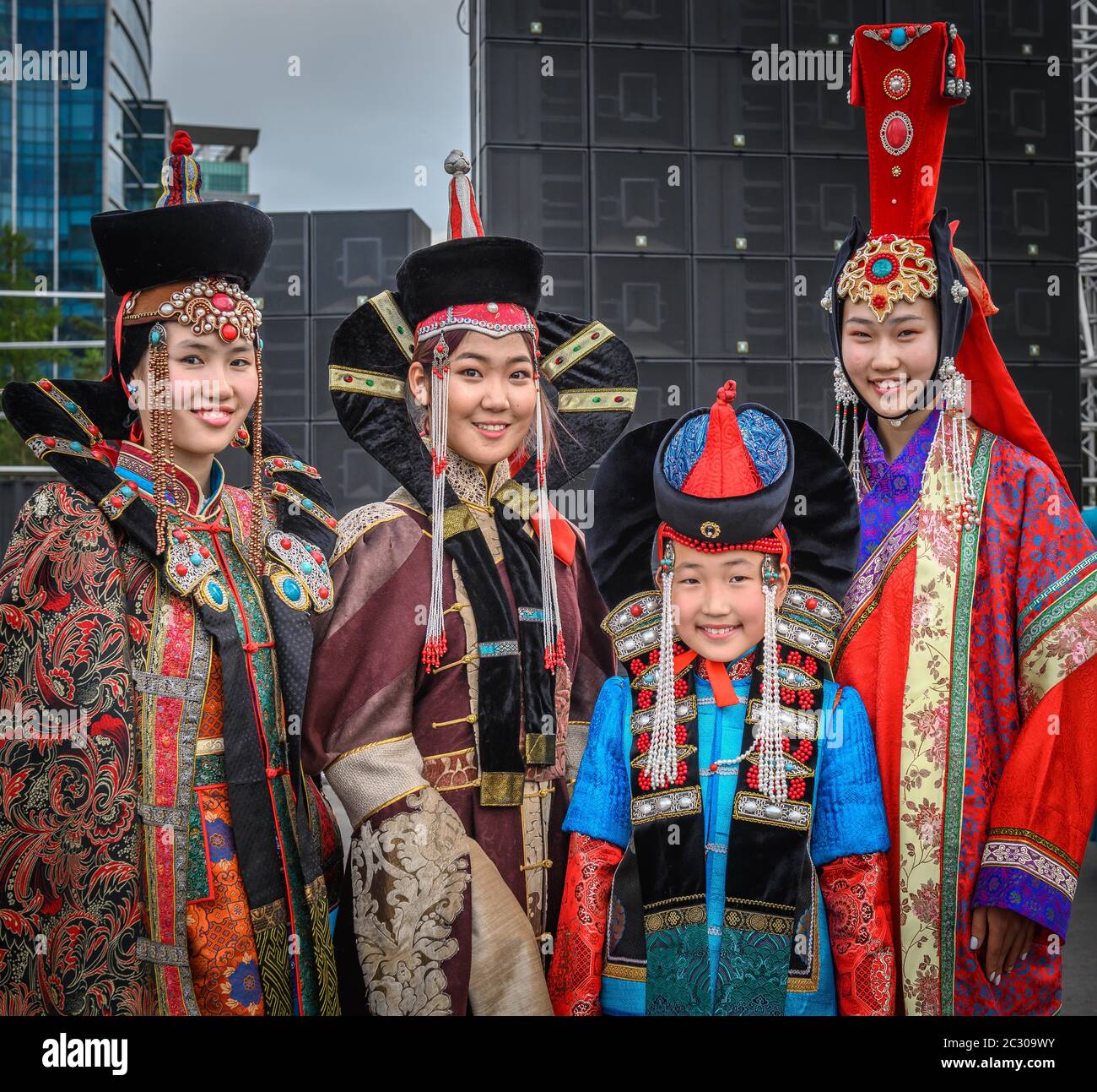 young-females-wearing-mongolian-traditional-costumes-and-posing-in-the