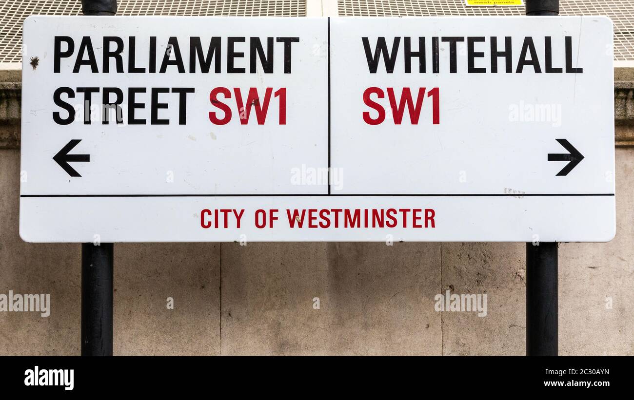 London, UK - 5th June 2017: Iconic City of Westminster road sign giving directions to Parliament Street and Whitehall, SW1. This is the centre of UK G Stock Photo