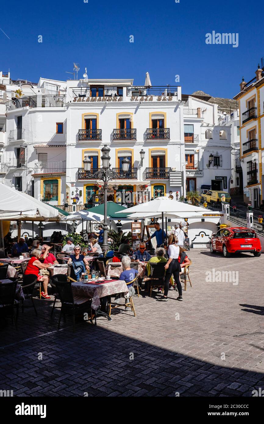 Restaurants at the village square in the white mountain village Competa ...