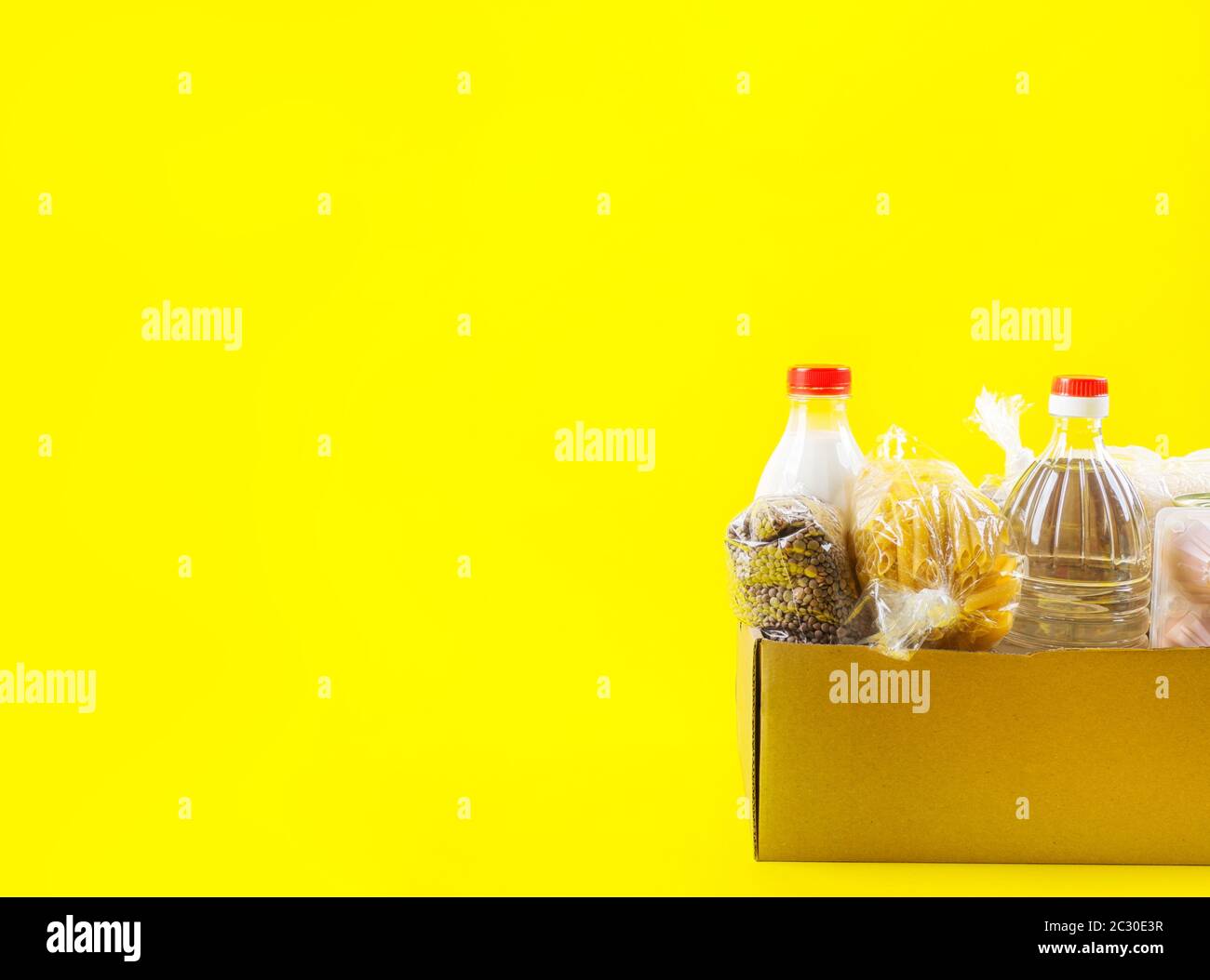 Food staples delivery or donation box concept Stock Photo Alamy