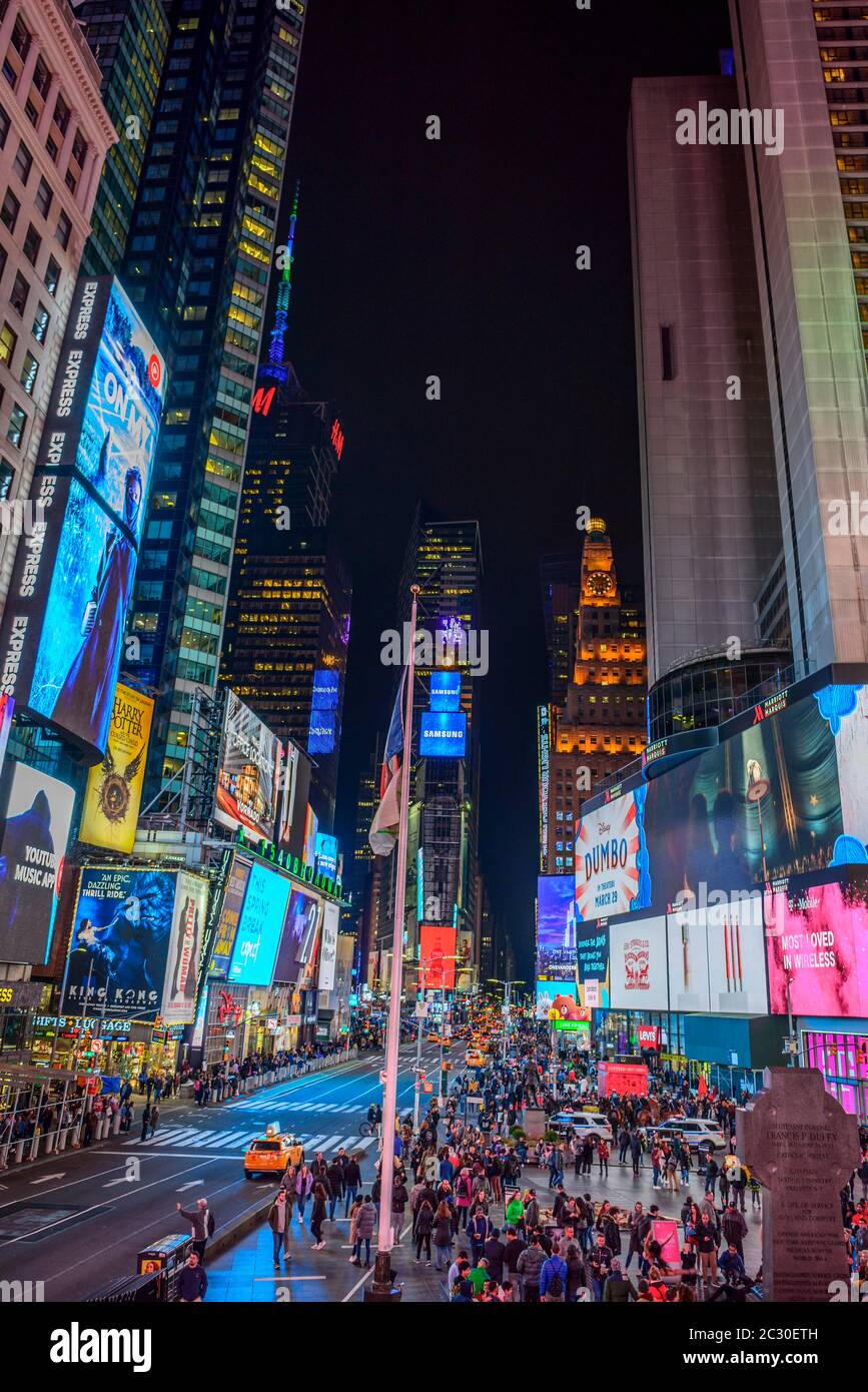 Times Square at night, Father Francis D. Duffy Statue and Duffy Square, Midtown Manhattan, New York City, New York State, USA Stock Photo