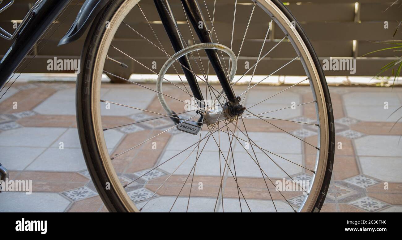 Close view of locked front wheel of a bicycle Stock Photo Alamy