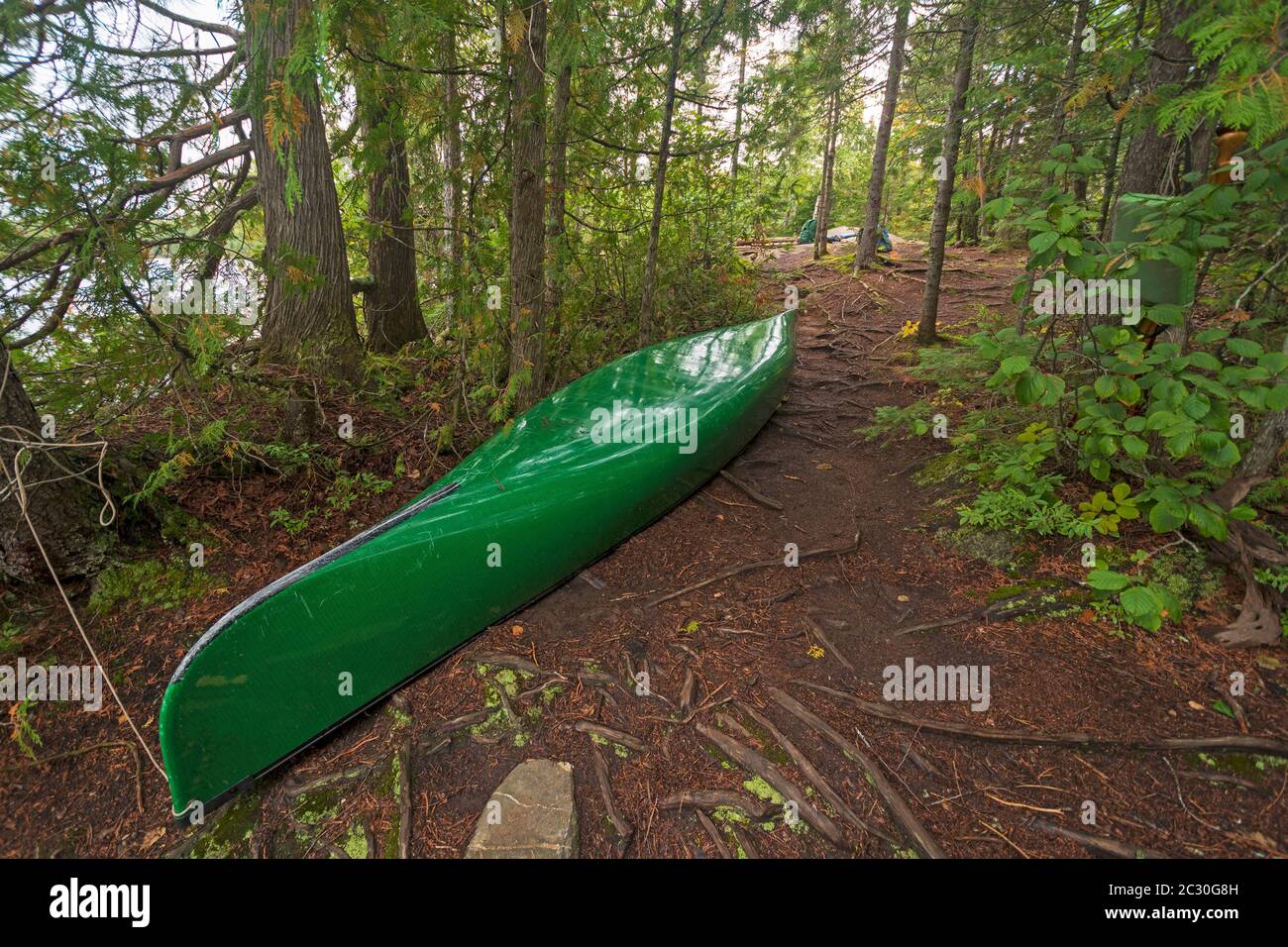 Canoe in a Wilderness Campsite on Omega Lake in the Boundary Waters in Minnesota Stock Photo