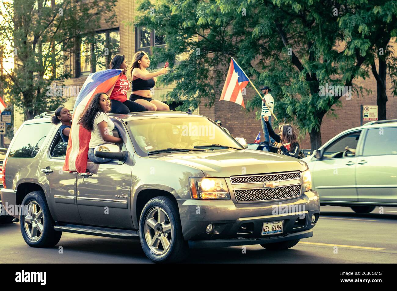 Chicago, USA-June 14, 2020: Hundreds of cars form a caravan in the Humboldt Park neighborhood to express Puerto Rican pride Stock Photo