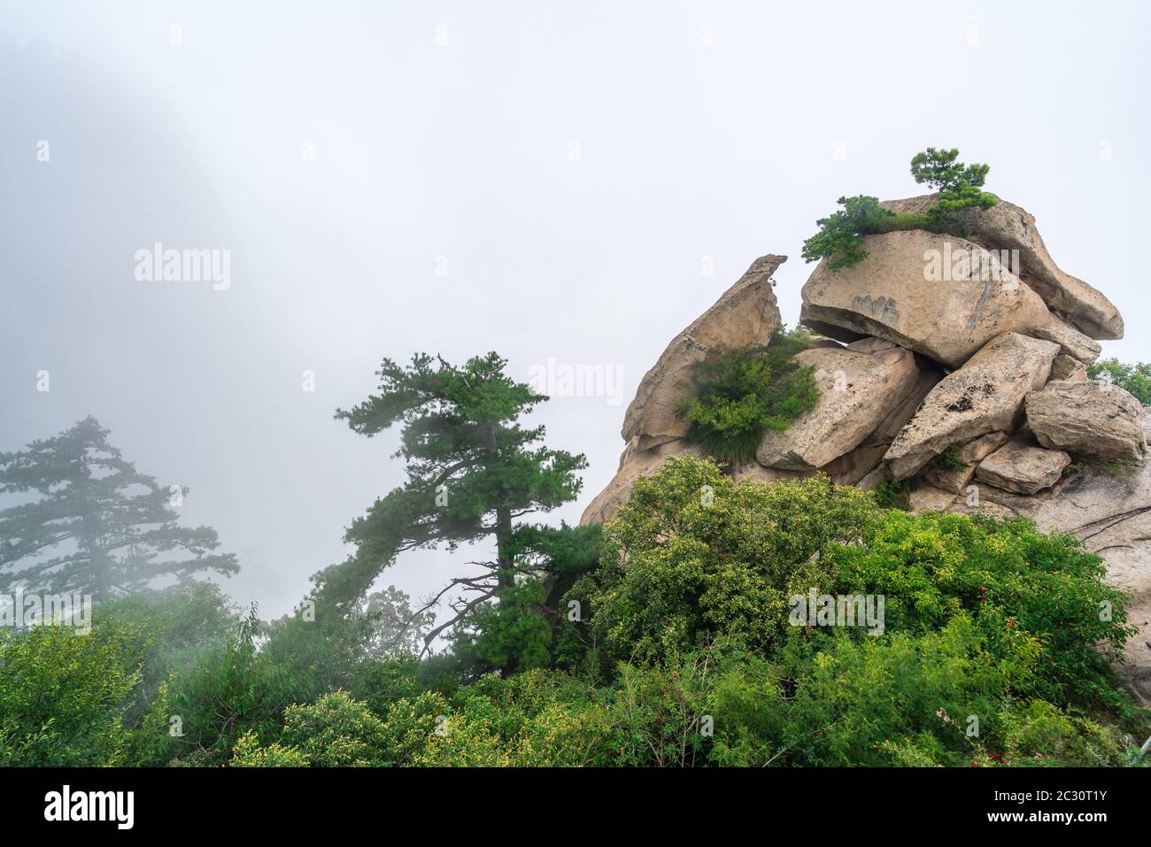 Pile of massive boulders on the summit of mountain landscape seen from the West Peak on Hua Shan mountain, Xian, Shaanxi Province, China Stock Photo