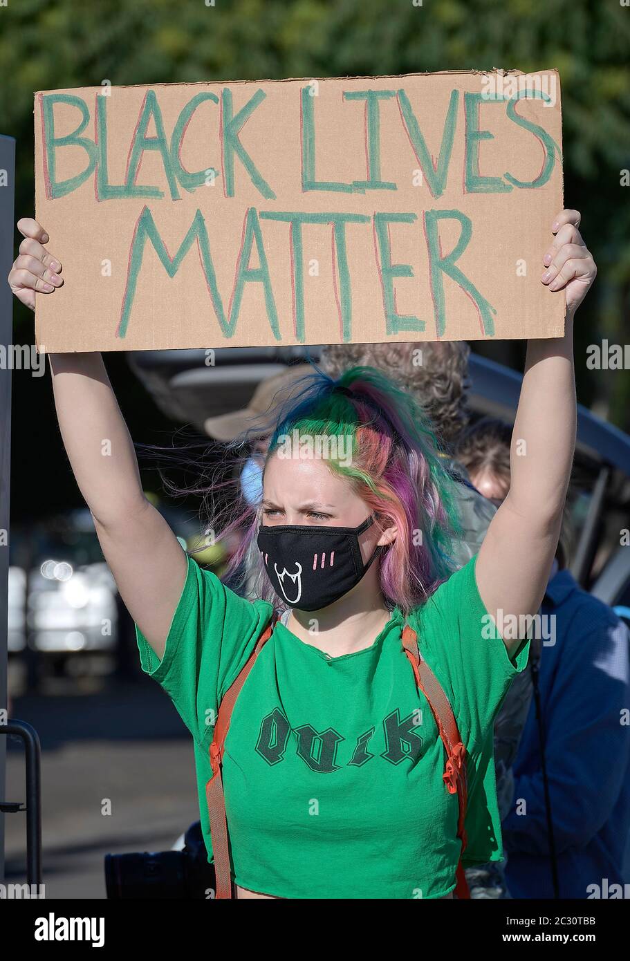 A woman holds a sign at a June 3, 2020, Black Lives Matter protest in Eugene, Oregon. Stock Photo