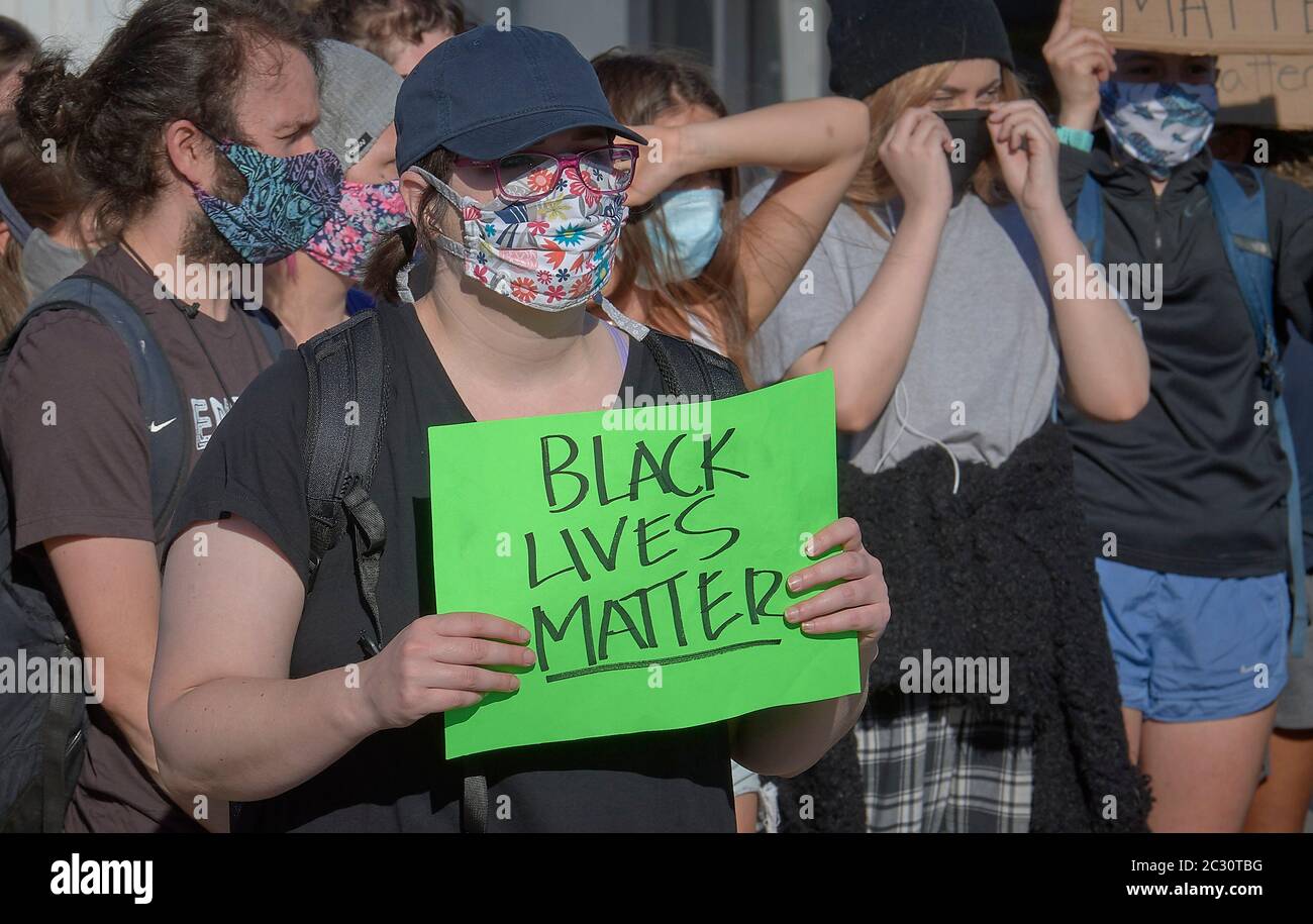 A woman holds a sign at a June 3, 2020, Black Lives Matter protest in Eugene, Oregon. Stock Photo
