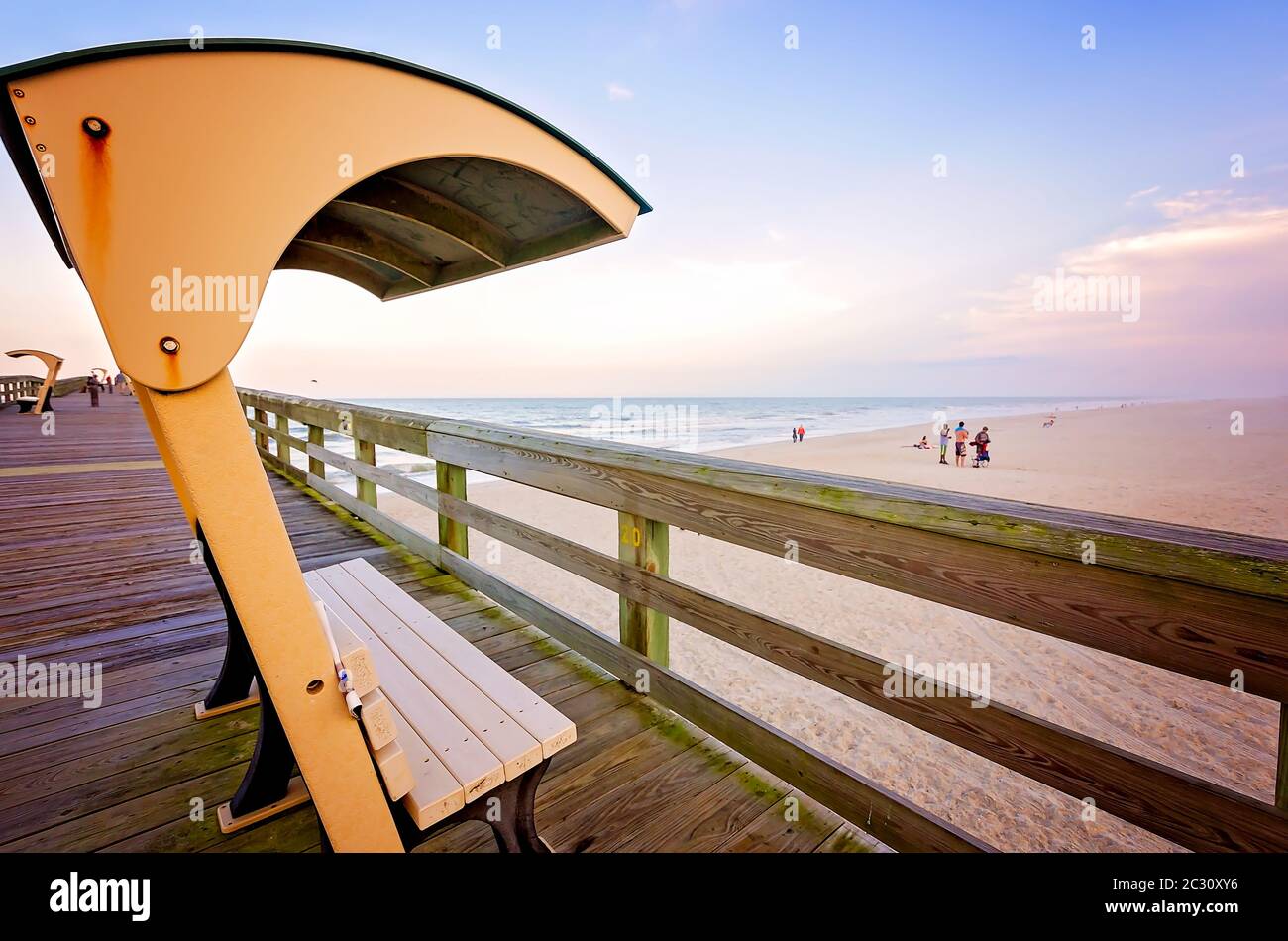 Covered benches line St. Johns County Ocean Pier, April 14, 2015, in St. Augustine, Florida. Stock Photo