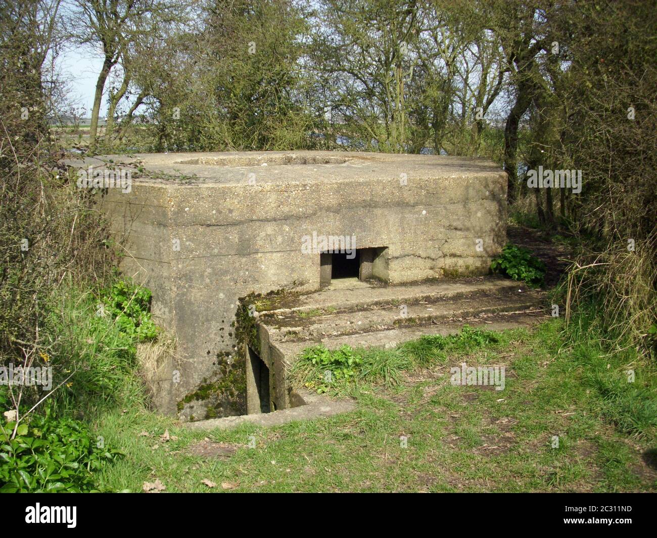 A World War Two concrete pillbox on the east coast of England. Shows