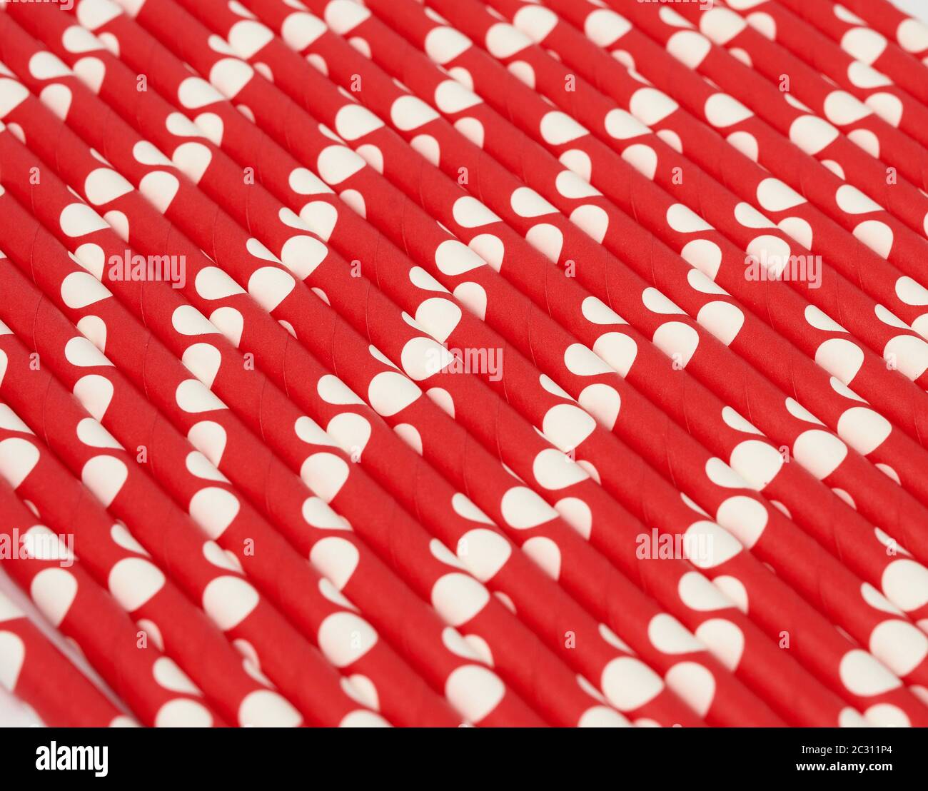 red paper cocktails with white polka dots, close up Stock Photo
