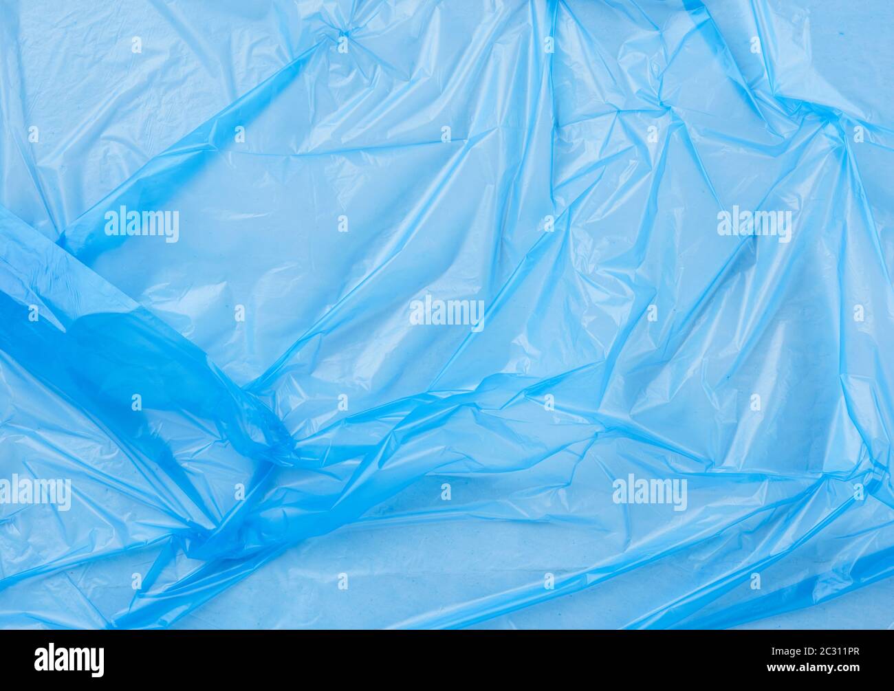 crumpled blue polyethylene texture, close up, full frame Stock Photo