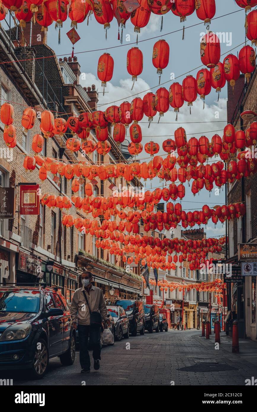 Download London Uk June 13 2020 Asian Man Wearing A Face Mask Walks Under Red Lanterns In Empty Chinatown An Area Of London Famous For Its Eateries And E Stock Photo Alamy PSD Mockup Templates