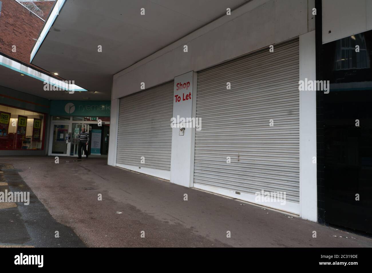 Shuttered up shops and To let sign. June 18th 2020. Covid 19 Pandemic. Stourbridge. West Midlands. UK Stock Photo